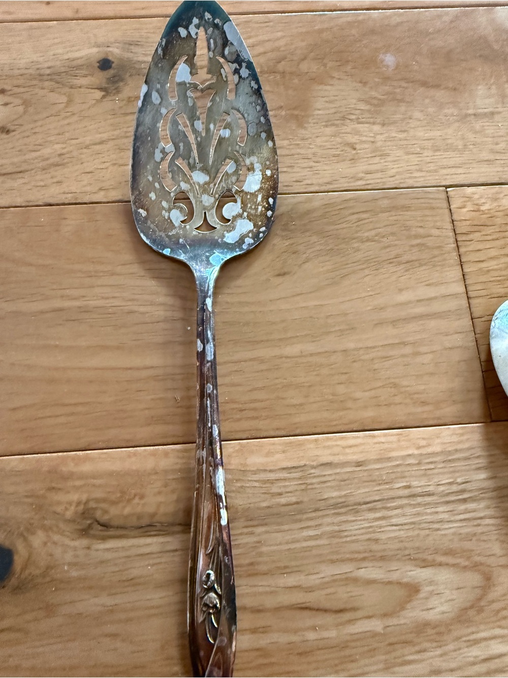 Ornate Pierced Serving Spoon in Aged Silver